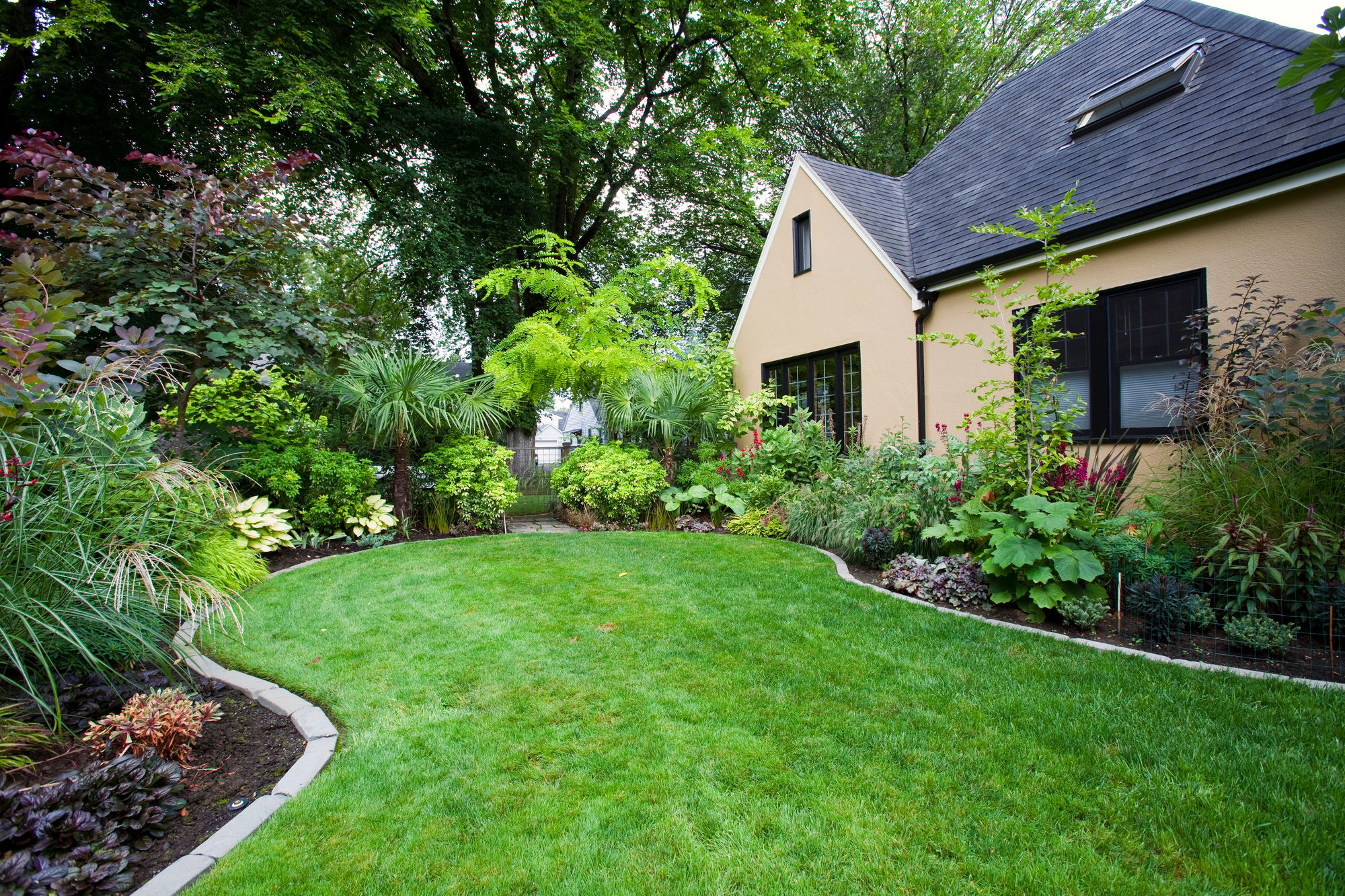 House and Landscaped Yard